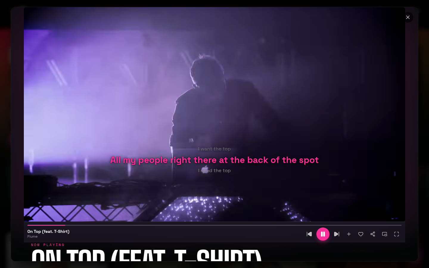 Karaoke mode on a desktop: the current line in pink over the video